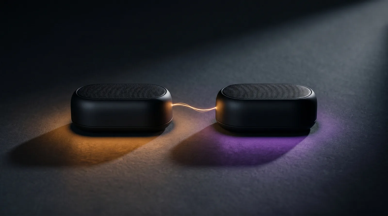 Two identical sound pucks on a dark surface connected by a thread of light, representing voice duplication and cloning